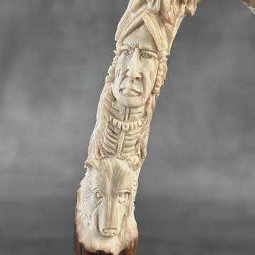 Snijwerk, NO RESERVE PRICE - A Native American with Animal