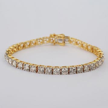 Tennis armband - 14 karaat Geel goud - 6.02ct. tw. Diamant