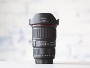 Canon EF 16-35mm f/4L IS USM - 1 jaar garantie!, Audio, Tv en Foto, Fotografie | Lenzen en Objectieven, Canon, Lensdoppen, Zo goed als nieuw