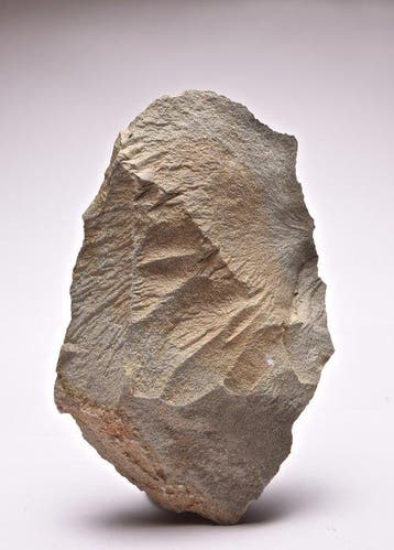 Grote paleolithsche kliever (cleaver) uit Tanzania rhyoliet