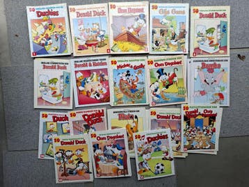 Donald Duck 50-reeks strips - Katrien, Dagobert, Pluto Dombo, Complete serie of reeks, Verzenden, Gelezen