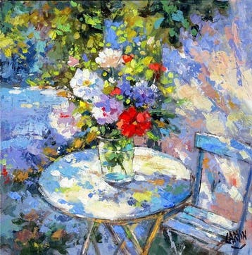 Carvin - Bouquet fleuri sur une table de jardin