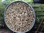 Houtopslag/Hottub oven gedroogd haardhout in krat en in zak.