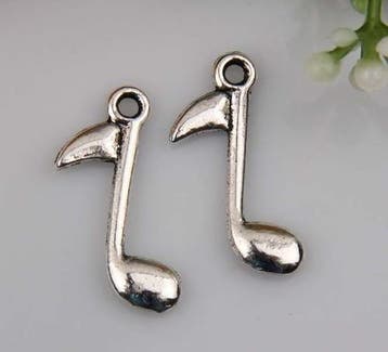 10 x Metalen bedel muzieknoot 24 x 15 x 2,5 mm – gat Ø 2., Ophalen of Verzenden, Nieuw, Bedel