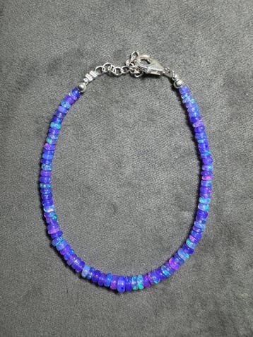 Armband met gladde paarse opalen uit Ethiopië + 925 zilver -