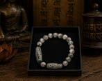 Mooie boeddhistische armband met Dzi-kraal met negen ogen -