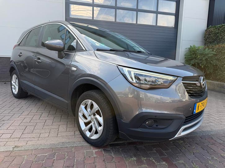 Opel Crossland X 1.2 Turbo 130pk Start/stop 2020 Grijs, Auto's, Automaat, Nieuw, SUV of Terreinwagen, Zilver of Grijs