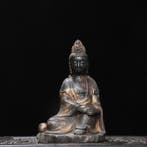 A Copper and gilt Ruyi Guanyin figure from a private