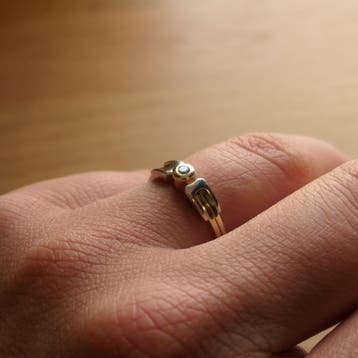 Desiree bicolor gouden solitair ring met diamant 0,03 ct., Gebruikt, Ophalen of Verzenden, Kleiner dan 17, Met edelsteen
