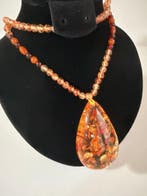Amber druppel-hanger ketting met kralen en ingebedde chips -