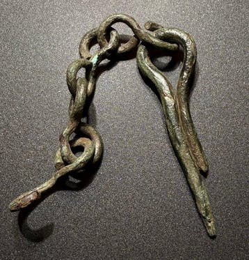 Viking periode Brons Vergrendelingsonderdeel in de vorm van