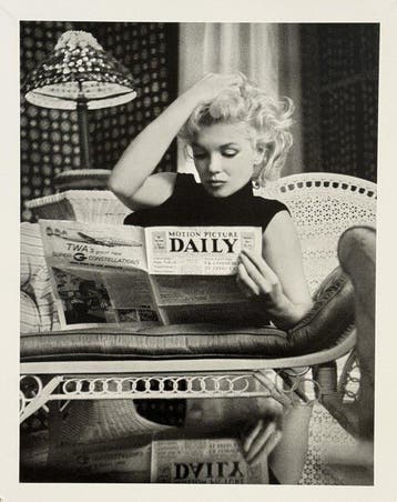 Marilyn Monroe - Reading Motion Picture Daily, 1953 |