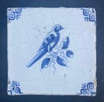 Tegel - Delfts blauwe tegel met een grote papegaai op een