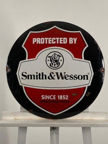 SMITH & WESSON - Emaille bord - Ø50 cm - Gemaakt van een, Antiek en Kunst, Antiek | Wandborden en Tegels