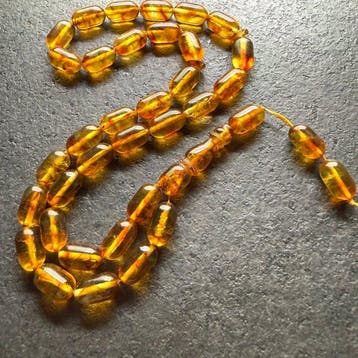 Tesbih gebed-rosenkrans kralen capsulevormig - Barnsteen -