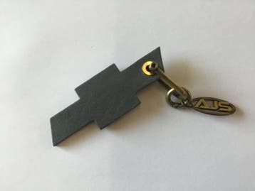 Chevrolet logo grijs leer sleutelhanger, Ophalen of Verzenden, Nieuw