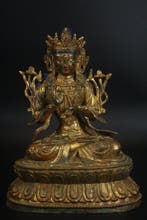 This is a bronze statue of Manjushri Bodhisattva - Metaal -