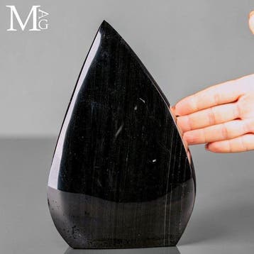 Glanzende zwarte obsidiaan met subtiele zilveren glans en