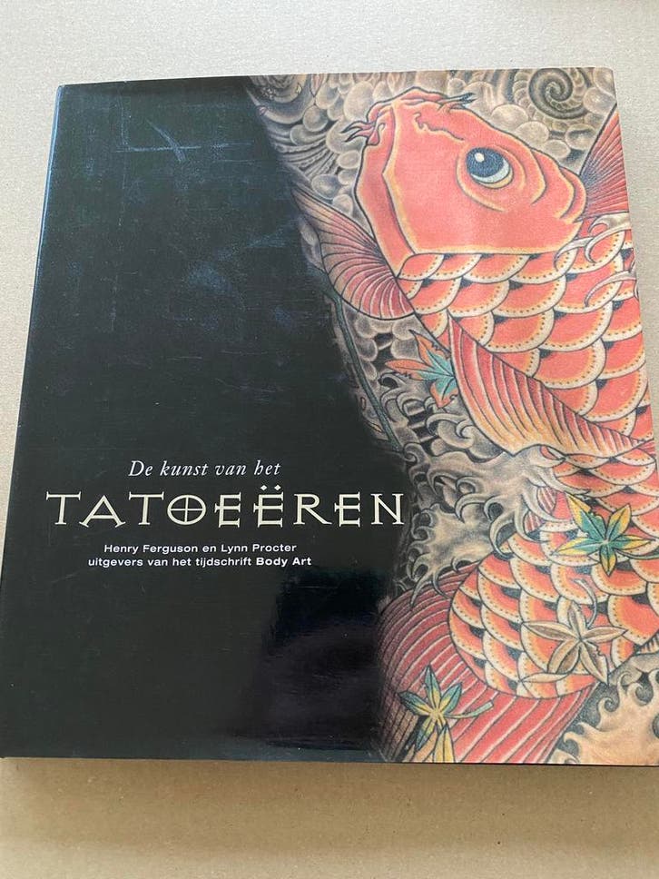 De Kunst van het Tatoeëren - Inspiratie informatieboek NIEUW, Boeken, Mode, Zo goed als nieuw, Overige onderwerpen, Ophalen of Verzenden