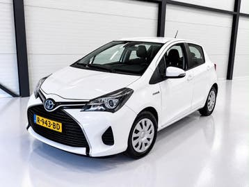 Toyota Yaris Aspiration 1.5 HSD 55KW 5DRS 2014 Wit, Auto's, Stof, Wit, Nieuw, Hybride Elektrisch/Benzine