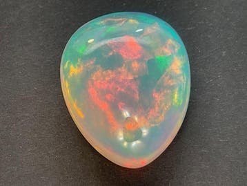 1 pcs Meerkleurig, Wit Opaal - 11.96 ct - Antwerp Laboratory, Nieuw