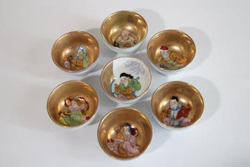 Kutani-porselein - Set van zeven sakebekers van de Zeven