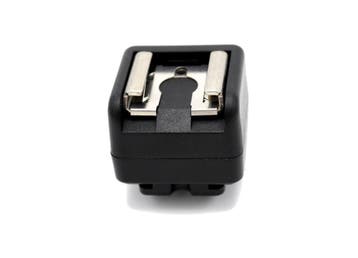 Caruba Hotshoe Adapter - Middencontact naar X Contact, Ophalen of Verzenden, Nieuw, Overige merken