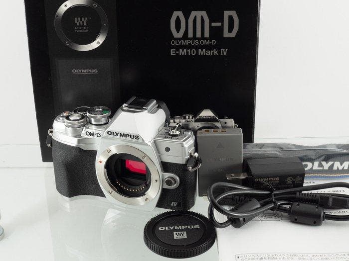 Olympus OM-D E-M10 Mark IV Silver body Shot 1495 Spiegelloze, Audio, Tv en Foto, Fotocamera's Digitaal