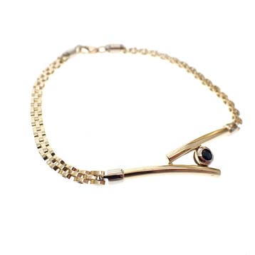 Bicolor gouden bismarck schakelarmband met saffier, Gebruikt, Ophalen of Verzenden, Met edelsteen, Goud