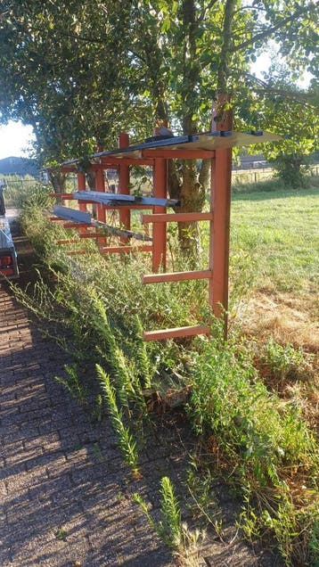 Draagarmstelling: 4,8 x 2,1M1 (5 staanders) en 20 armen, Ophalen