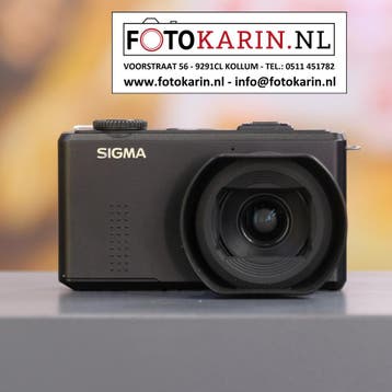 Sigma DP1 Merrill compactcamera occasion | Foto Karin Kollum, Gebruikt, Ophalen of Verzenden, Lensdop, Compactcamera