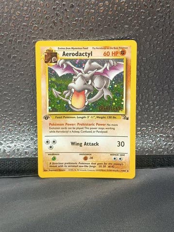 Pokémon - 1 Card - Aerodactyl first edition Prerelease First, Hobby en Vrije tijd, Verzamelkaartspellen | Pokémon, Nieuw