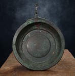 Oud-Romeins Haakbronzen kom als offer, gegraveerd met
