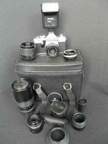 Praktica Super TL3 met 3 lenzen , 2 converters , 4, Nieuw