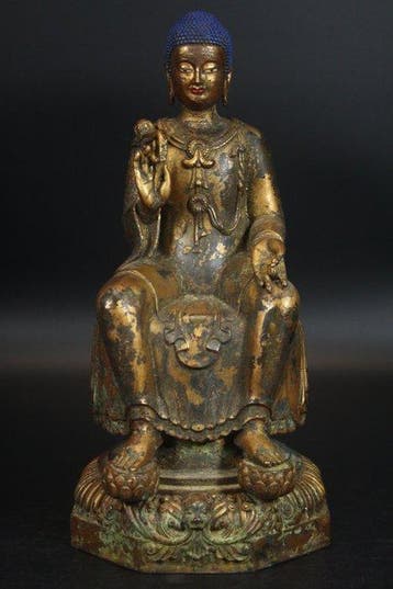 This is a seated Amitabha Buddha statue, strikingly similar