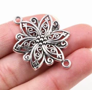 Metalen verdeler – bloem edelweiss 40x28 mm – antiek zil, Ophalen of Verzenden, Nieuw, Tussenstuk of Tussenkraal