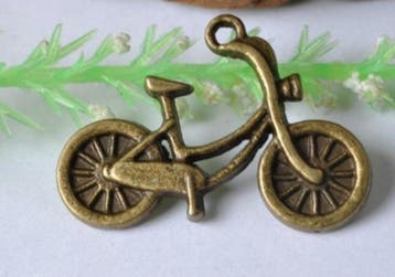 4 x metalen bedel van een oma fiets 18 x 26mm geel koper..., Ophalen of Verzenden, Nieuw, Kraal