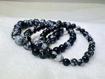 ***GEEN RESERVE*** Snowflake Obsidian Armbandenset van 3 –