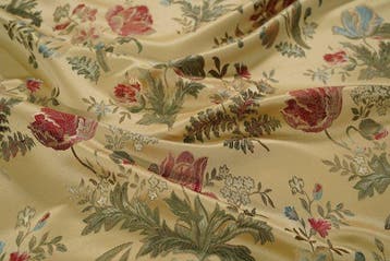 Gouden meubelstof met bloemmotieven in klassieke stijl -