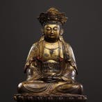 A prized brass statue of Guanyin Bodhisattva, from a private