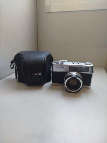 Minolta Hi-matic 7s with Rokkor-PF 1,8/45mm, original case,, Nieuw