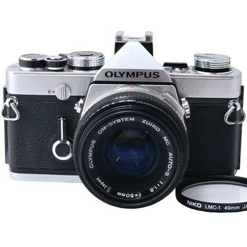 Olympus OM-1 + F.Zuiko 1.8/50mm – Serviced | Single lens, Audio, Tv en Foto, Fotocamera's Analoog, Nieuw