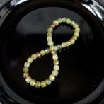 Zonder voorbehoud. Armband met multikleurige granaat of