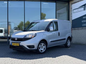 Fiat Doblò Cargo 1.3 MJ L1H1 SX*AIRCO*NAVI*CRUISE*PDC*BLUETO, Stof, Gebruikt, Zilver of Grijs, Lease