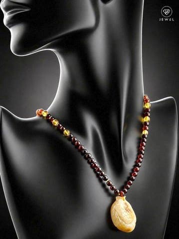 Barnsteen - Unique Baltic Amber FISH Necklace – Hand Carved