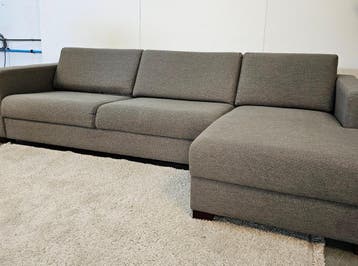 Hoekbank Gewoven Stof Grijs - Professioneel Gereinigd, Huis en Inrichting, Banken | Complete zithoeken, Ophalen of Verzenden, Nieuw