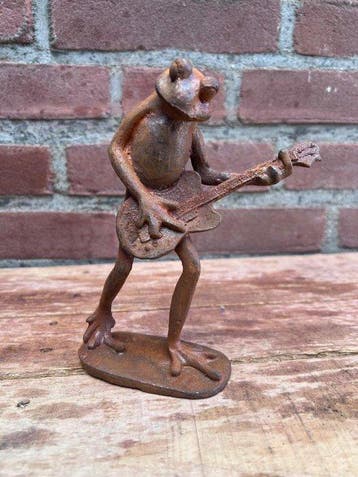 Decoratief ornament - Europa - Kikker die gitaar speelt