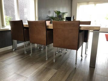 Set van 6 bruine leren kuip stoelen met wielen, Ophalen of Verzenden, Nieuw, Leer