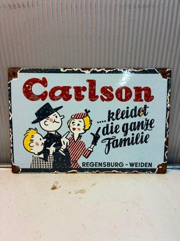 Carlson – Kleidet die ganze Familie – Emaille Reclamebord -