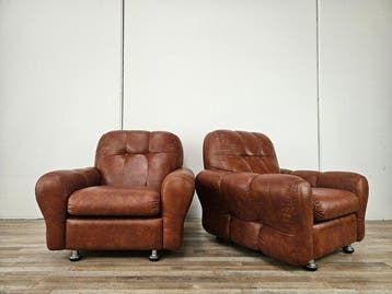 Fauteuil (2) - Een paar leren fauteuils uit de jaren